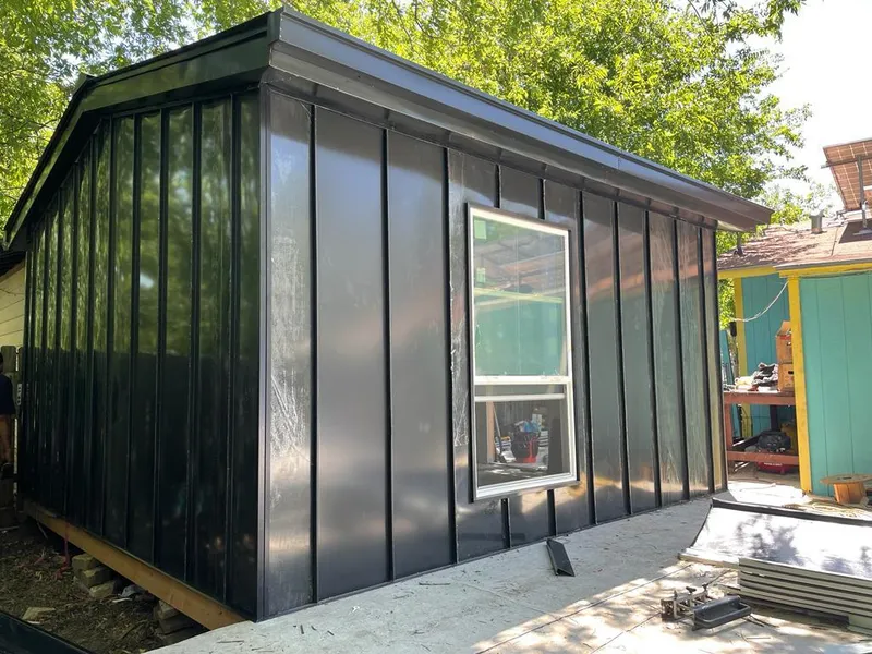 Black standing seam metal wall panels for Roof Inspection in Lynbrook